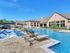 Beautiful Luxury pool with lounge chairs.Small courtyard.