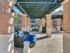 Beautiful view of our large outdoor courtyard. With three sets of outdoor furniture.
