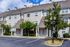 The Henry Apartments, exterior, building, door side parking, trees