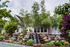 The Henry Apartments, exterior, main building, stone water fall, trees,