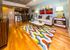 Modern Living Room with Light Wood Flooring | Downtown Houston Apartments for Rent | Skyhouse Downtown