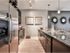 State-of-the-art kitchen with granite countertops and stainless steel appliances