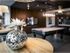 Resident game room and media lounge with billiards table