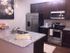 Kitchen with full appliance package and granite countertops l Monterey Pointe