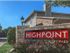 High Point Apartments entrance surrounded by beautiful landscaping
