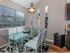 Dining room with designer light fixture