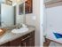 Spacious Master Bathroom with espresso cabinets