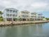 Exterior of Tarpon Harbour facing the water