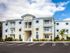 Yellow-and-white building exterior shot l High Ridge Landing