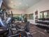 Fitness center with elliptical machines, treadmills, universal weight machine and free weights l High Ridge Landing