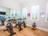 Three spin bikes in Fitness Studio with free weights l High Ridge Landing