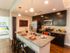 Granite countertops, full stainless steel appliance package including microwave and pendant lighting in kitchen l High Ridge Landing