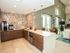 Resident Lounge kitchen with coffee station, TV, and kitchen area l High Ridge Landing
