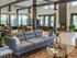 The Henry Apartments, interior, clubhouse, spacious seating areas, fire place, tables and chairs, large windows, natural light