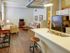 Residents Cooking in the Kitchen | Apartments Homes for rent in Pittsburgh, PA | Heinz Lofts