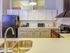 Residents Snacking in the Kitchen | Apartments Pittsburgh, PA | Heinz Lofts