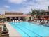 Residents Lounging by the Pool | Chula Vista CA Apartments For Rent | Casa Lago