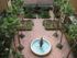 Mirasol at Celebration, exterior, aerial view of courtyard, fountain, palm trees, benches