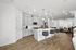 Kitchen with large island and bar seating