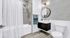 Luxurious Bath with Full Wall Tile