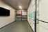 Modern home gym featuring workout equipment and inspirational wall art.