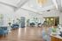 Bright and inviting lobby with modern seating, natural light, and elegant decor, perfect for welcoming guests.