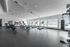 Spacious, well-lit gym with state-of-the-art cardio equipment, perfect for fitness enthusiasts.