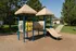 Charming playground with a modern jungle gym, tic-tac-toe station, and slide, surrounded by lush greenery and perfect for family fun.