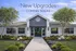 Charming modern home with new upgrades coming soon, featuring elegant landscaping and a welcoming walkway.