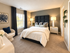 Elevate 311 Apartments - Cozy Bedroom