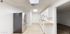 Bright, modern kitchen featuring sleek stainless steel appliances, pristine white cabinetry, and elegant wooden countertops for a stylish living experience.