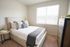 Studio, One, and Two-Bedroom Apartments in Doylestown PA - Butler Square - Bedroom with Bed, Dresser, Nightstand, Window, and Plush Carpeting