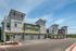 Modern apartments with sleek architecture, and attachd garages