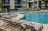 Resident pool with loungers and direct access to resident clubhouse