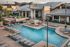 Resident pool with loungers and direct access to resident clubhouse