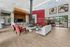 Modern resident clubhouse with fireplace and community kitchen