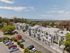 Charming apartment community with scenic views and lush greenery offering serene living with modern amenities.