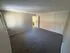 Spacious bedroom with cozy carpeting, ample built-in closet space, and access to a bright adjacent bathroom.
