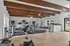 Inviting fitness center with state-of-the-art cardio machines and bright natural lighting, enhancing your workout experience.