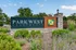 Charming entrance to Parkwest Apartments surrounded by lush greenery and a serene atmosphere.
