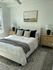 Large bedroom with plenty of natural light