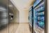 Modern apartment amenities featuring a sleek package concierge system and well-stocked vending machines for ultimate convenience.
