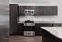 Modern kitchen with sleek dark cabinetry, stainless steel appliances, and granite countertops creating a contemporary and stylish space.