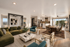 Luxurious open-concept living and dining area with elegant decor, featuring plush seating, a stylish kitchen, and abundant natural light.