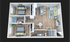 Contemporary open-plan layout featuring two cozy bedrooms, a modern kitchen with island seating, and a welcoming living area with large windows.