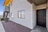 Charming apartment exterior with inviting entrance and modern stucco finish, featuring door number 1093.