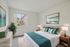 Bright and airy bedroom with modern decor, featuring a comfortable bed, elegant bedside tables, and a large window offering scenic views.