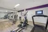 Bright and inviting gym with modern cardio and strength equipment, perfect for a healthy lifestyle.