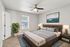 Chic bedroom interior with modern decor, showcasing a comfortable bed, elegant lighting, and stylish furnishings.