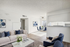 Bright, virtually staged living area with modern furniture, plush seating, and a stylish dining corner.